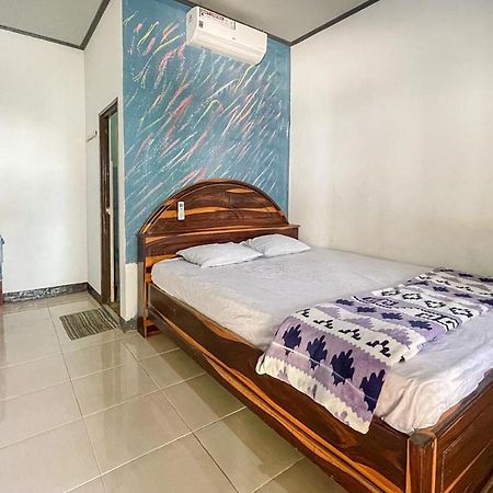 Ekas Beach Guesthouse Mitra Reddoorz Exterior photo