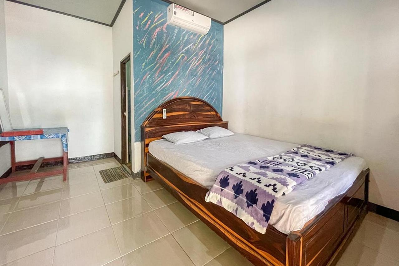 Ekas Beach Guesthouse Mitra Reddoorz Exterior photo