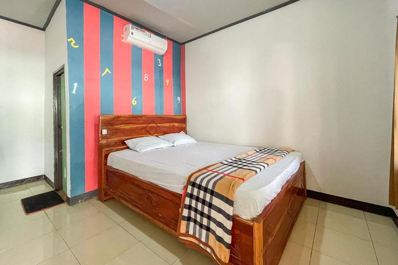 Ekas Beach Guesthouse Mitra Reddoorz Exterior photo