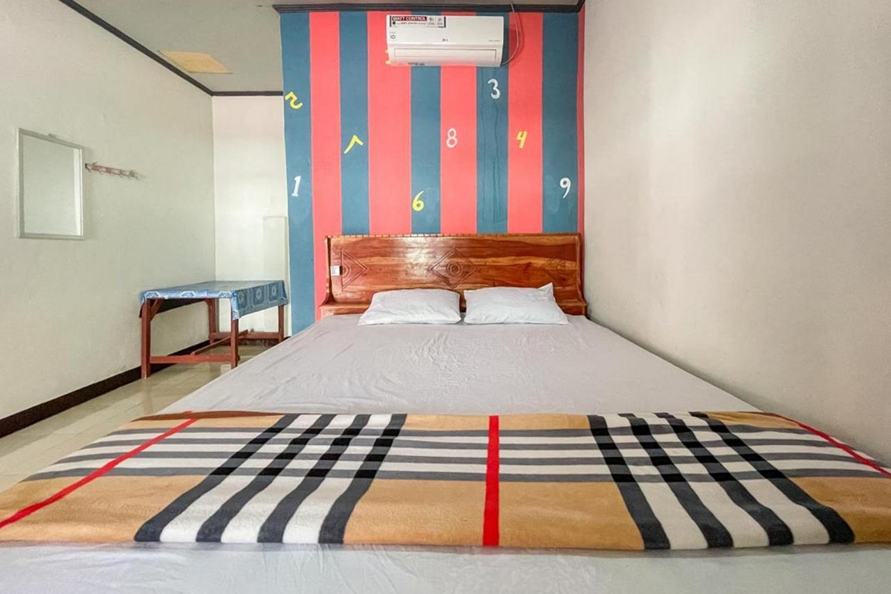Ekas Beach Guesthouse Mitra Reddoorz Exterior photo