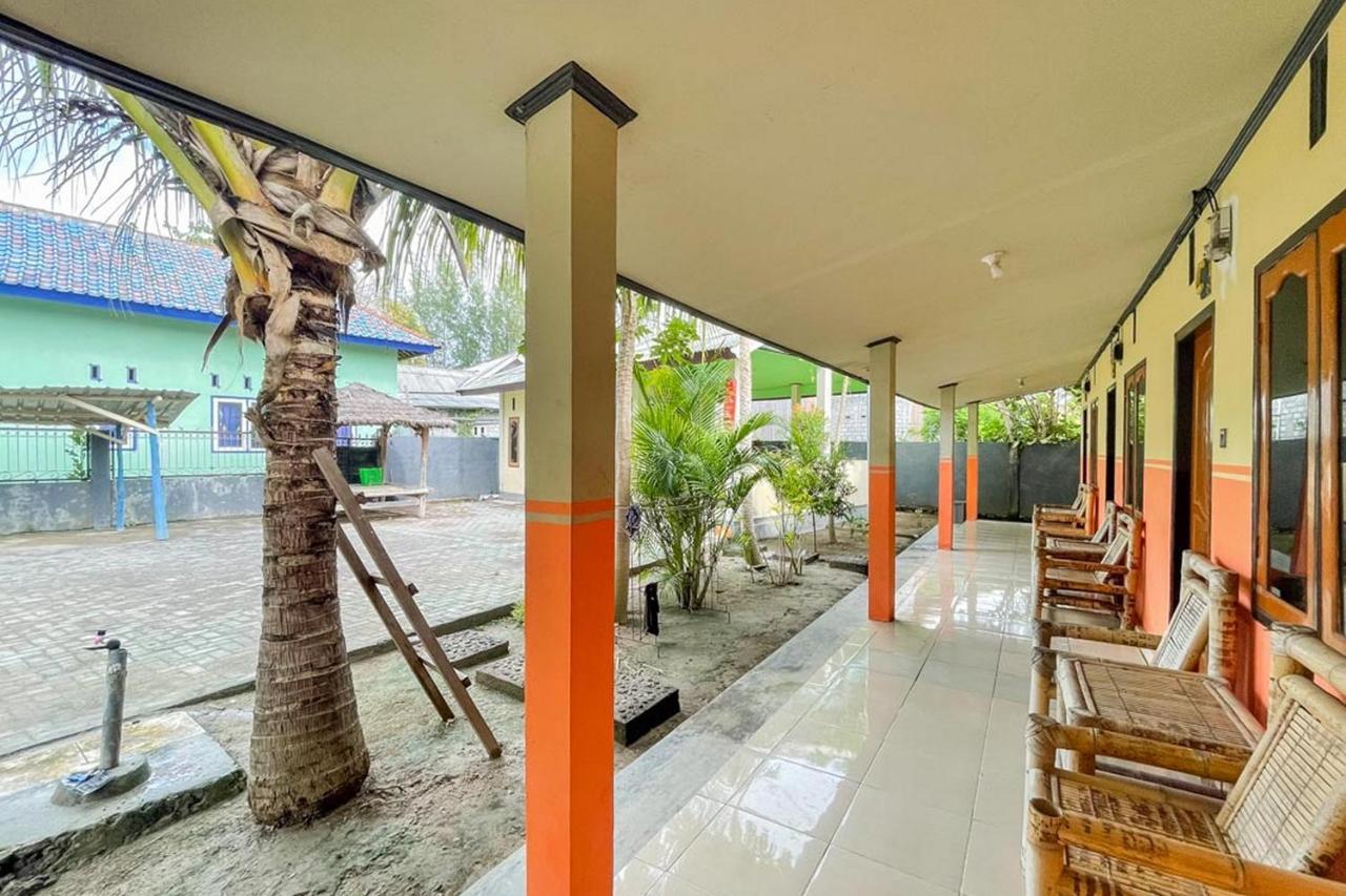 Ekas Beach Guesthouse Mitra Reddoorz Exterior photo